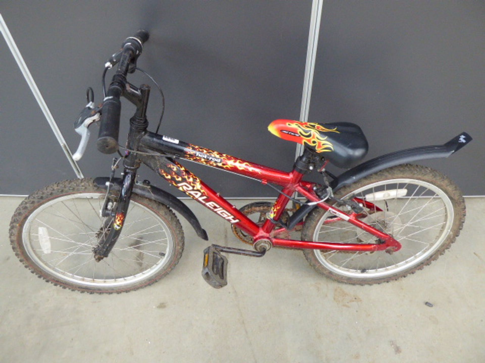 Small Raleigh childs bike in red with flames