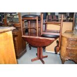 Dark wood circular drop leaf table with 2 teak framed chairs with black rexine upholstery