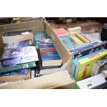 2 boxes containing a quantity of paperback novels