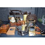 Cage containing a tea tin, compacts and wooden trinket boxes