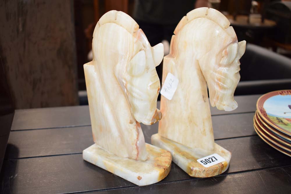 2 carved onyx bookends in the form of horses heads