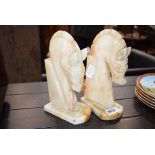 2 carved onyx bookends in the form of horses heads