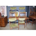 Teak extending dining table with 4 teak framed green draylon upholstered chairs *Collector's Item: