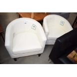 Pair of white leather tub chairs