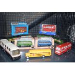 Cage containing matchbox, corgi and other buses
