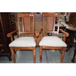 Pair of teak framed armchairs with grey upholstery
