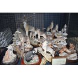 Collection of country artists ornamental wolves and badgers