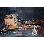 (C) Cage containing a quantity of costume jewellery and caligraphy pens
