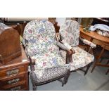 Pair of oak framed armchairs with loose covers and floral fabric plus a spindlebacked armchair in