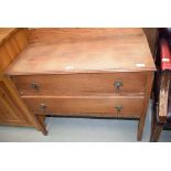 Oak chest of two drawers on raised supports