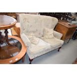 5212 Brown floral wingback two seater sofa
