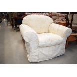 Cream and beige floral armchair