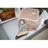 Boxed oriental figure