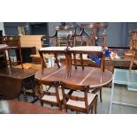 5299 Reproduction mahogany extending dining table plus 6 chairs to include 2 carvers