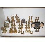 Quantity of miniature brass candlesticks and furniture