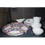 5632 Cage containing Chinese entree dishes plus flan dishes and a jug