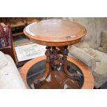 Circular walnut tripod table