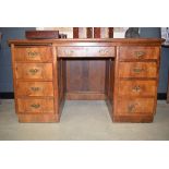5008 - Oak knee-hole desk with brown leather insert