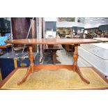 Oval reproduction yew coffee table