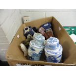 Box of blue and white jars, mugs, glassware, etc.