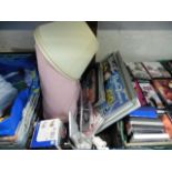 (2319) Crate of various CDs, DVDs, lamp shades, pictures, etc.