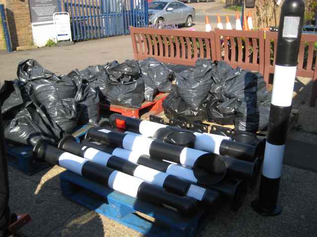 (1202) Pallet of black and white striped bollards