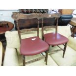 Pair of framed dining chairs with carved fleur-de-lis decoration *Collector's Item: Sold in