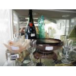 Half shelf of various glassware, champagne bottle, plated tray, etc.