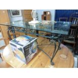 Wrought iron and glass top coffee table