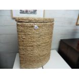 Woven corner laundry basket