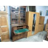 (2165) Oak bookcase with glazed shelves over fall front pull out bureau and 3 drawers under