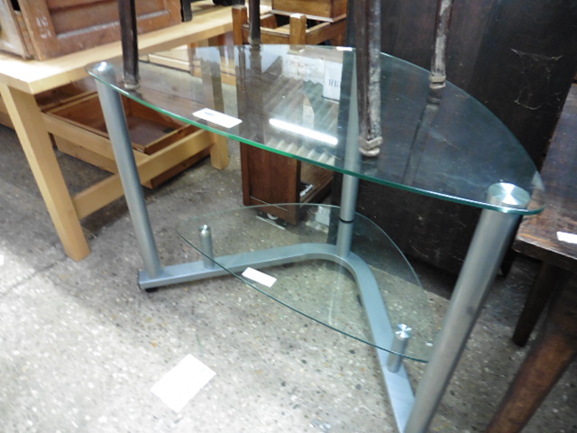 Glass and metal entertainment stand with shelf under