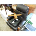 Brown faux leather swivel armchair and matching footstool