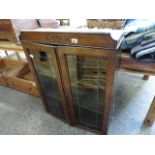 Oak leaded glazed shelf unit with Celtic decoration