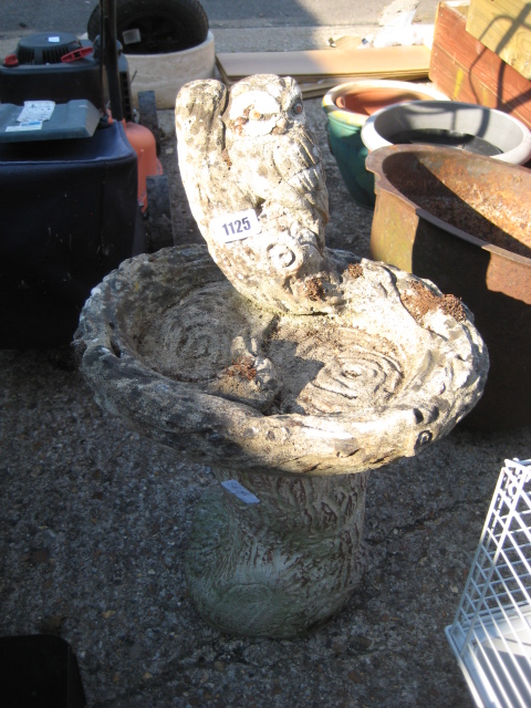 Small concrete bird bath