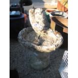 Small concrete bird bath