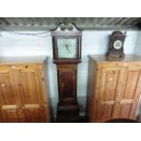 In Cooper of Coventry long case grandfather clock with floral and bird decoration