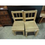 Pair of childrens beech chairs