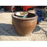 Large decorative ceramic plant pot with 3 others