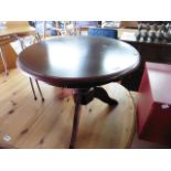 Mahogany effect circular coffee table on pedestal base