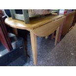 Circular drop leaf rubber wood dining table