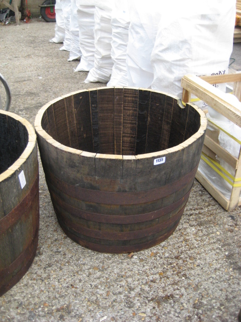 Half whiskey barrel planter