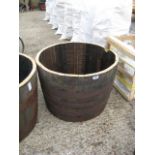 Half whiskey barrel planter