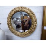 Circular gilt framed wall mirror