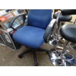 Blue upholstered swivel office armchair