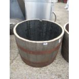 Half whiskey barrel planter