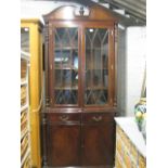 (2014) Mahogany cabinet with glazed shelves over pair of drawers and cupboards