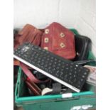 Crate containing leather bags, purses, glasses case, etc.