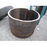 (1135) Half whiskey barrel planter