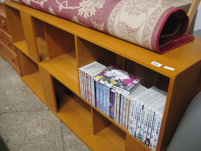 Long low oak finish bookcase